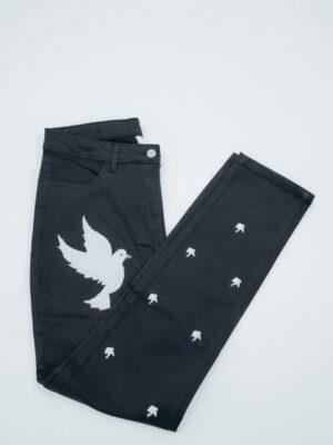 Handpainted Dove Embellished Pant in black denim featuring white handpainted dove artwork